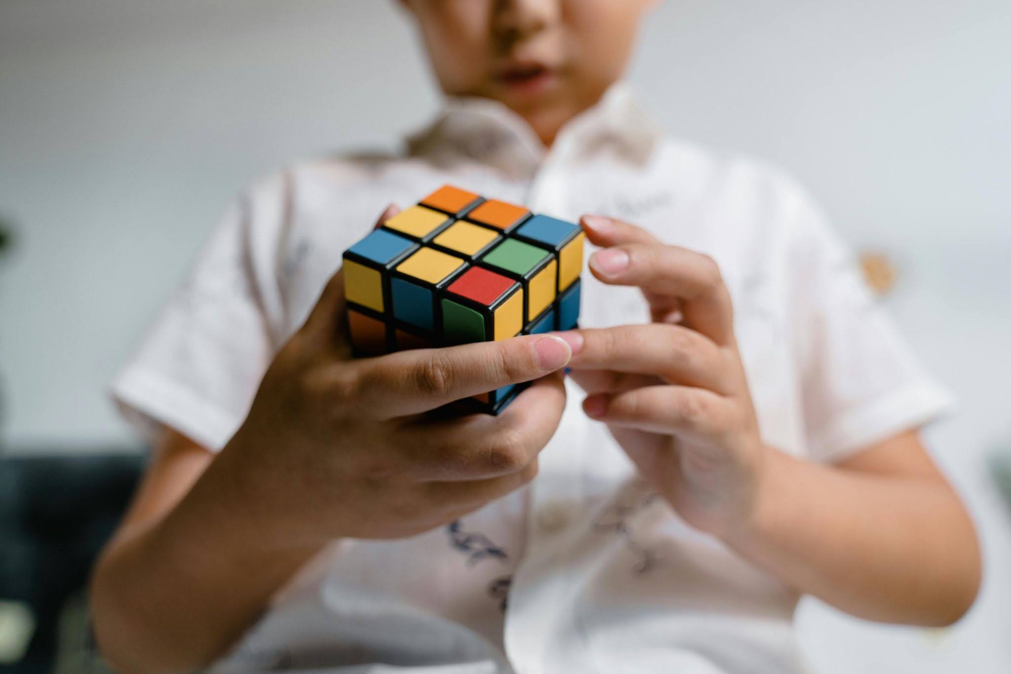 A young autistic savant solves a Rubik’s Cube