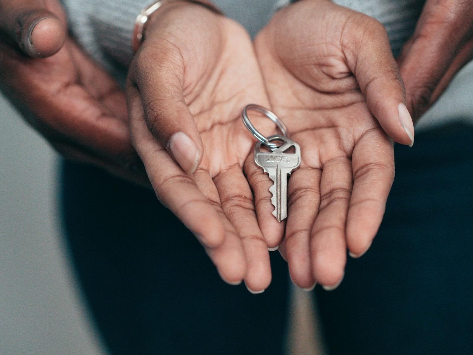 Rental assistance in the self-determination program allows for two people holding keys in their hands