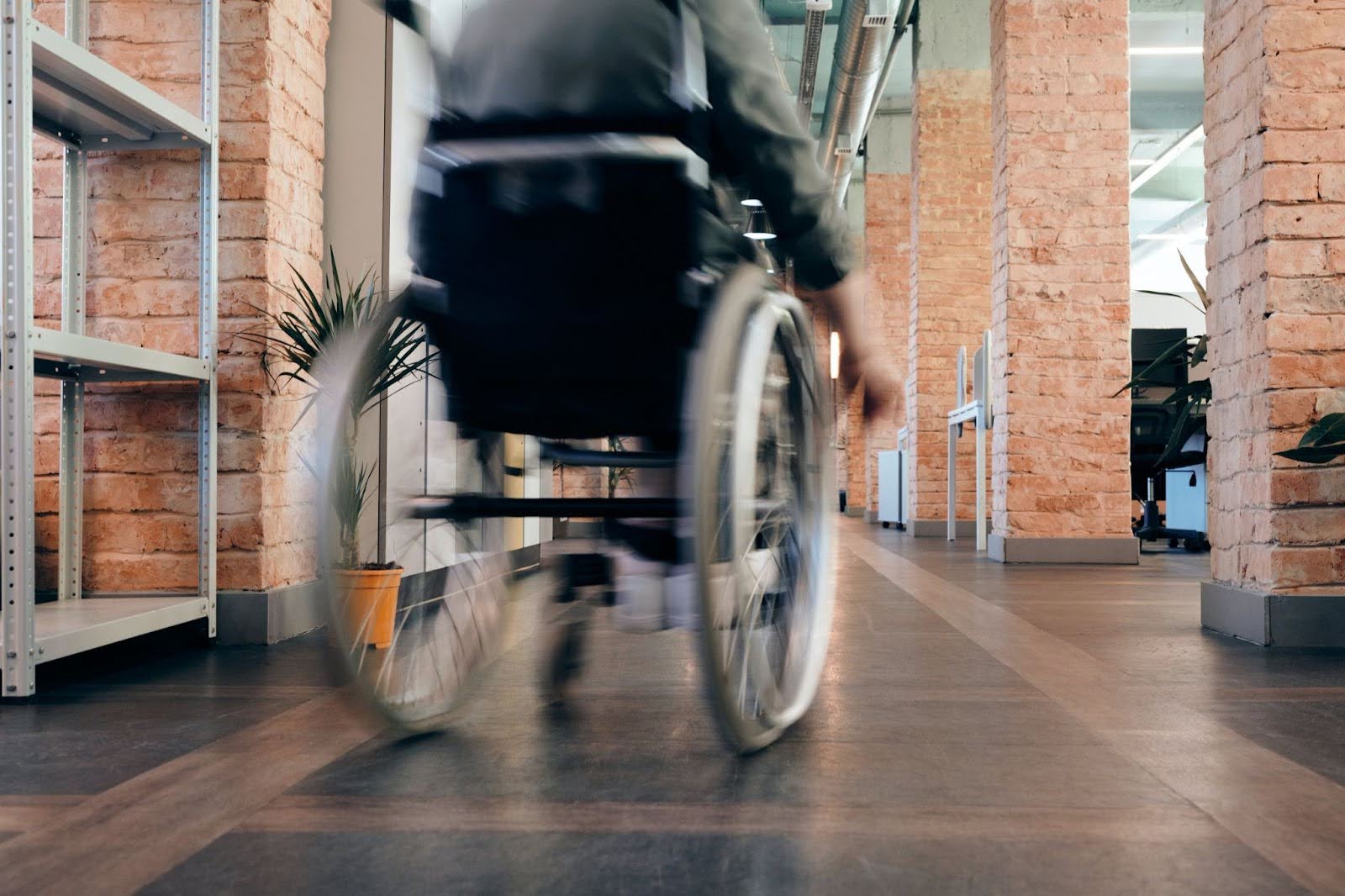 An action shot of someone in a wheelchair