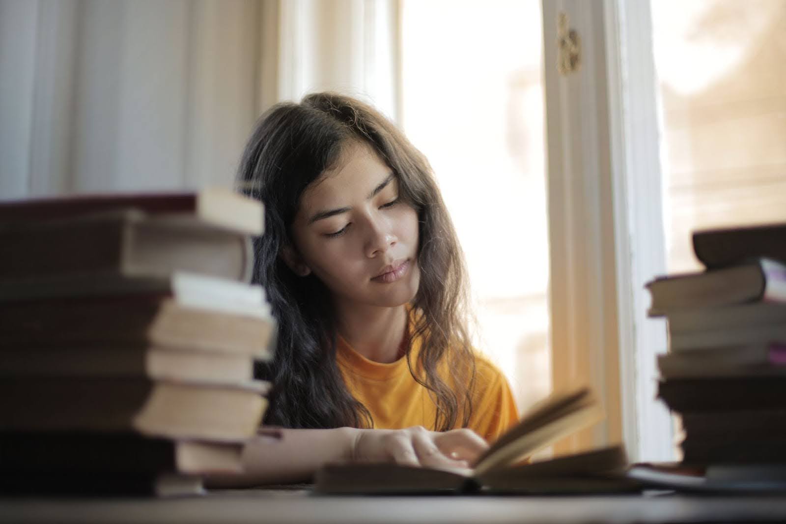 A woman reading books